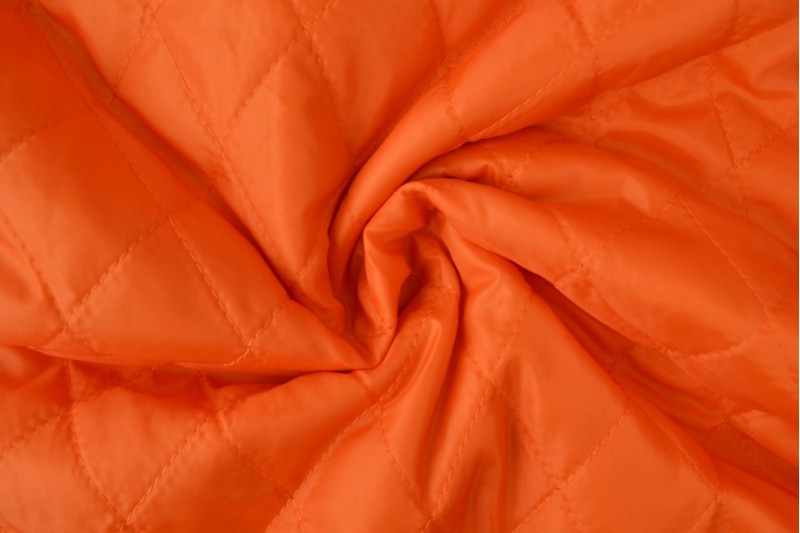 Gewatteerde voering oranje, rol
