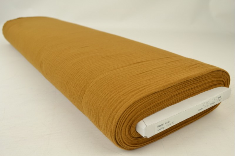 Mousseline (hydrofiel) donker okergeel, rol