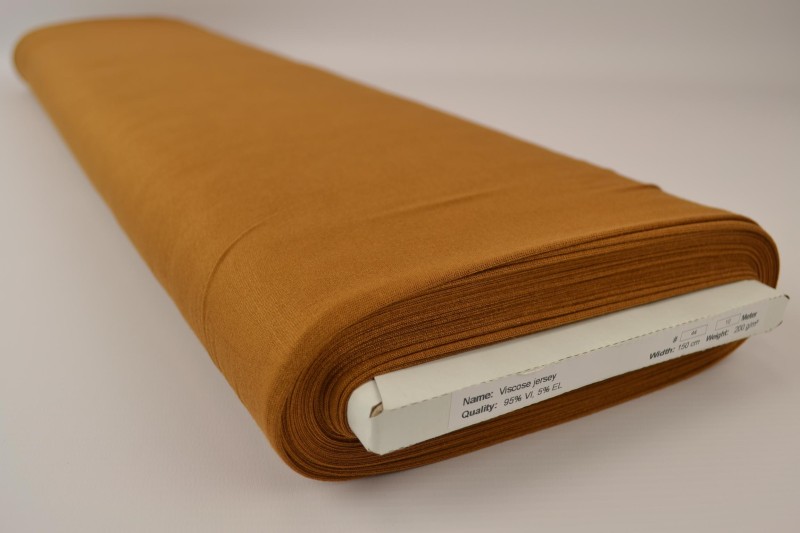 Viscose tricot donker okergeel, rol